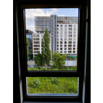 Wzmocniona siatka dla kota na okno bezinwazyjny montaż Warszawa