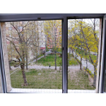 Siatka wzmocniona ochronna dla kota na okno montaż Warszawa