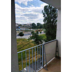 Wzmocniona siatka ochronna dla kota na balkon montaż Warszawa