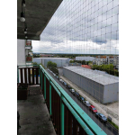 Wzmocniona siatka ochronna przeciw gołębiom na balkon montaż Warszawa