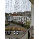 Wzmocniona siatka drutem ochronna dla kotów na balkon montaż Warszawa