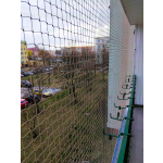 Siatki zabezpieczające balkon dla kota